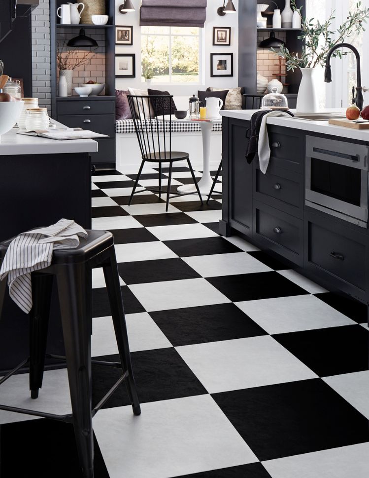 checkered luxury vinyl tile flooring in a modern kitchen