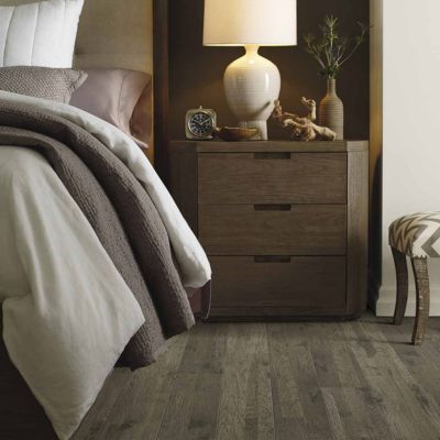 wood look laminate flooring in a cozy Texas bedroom